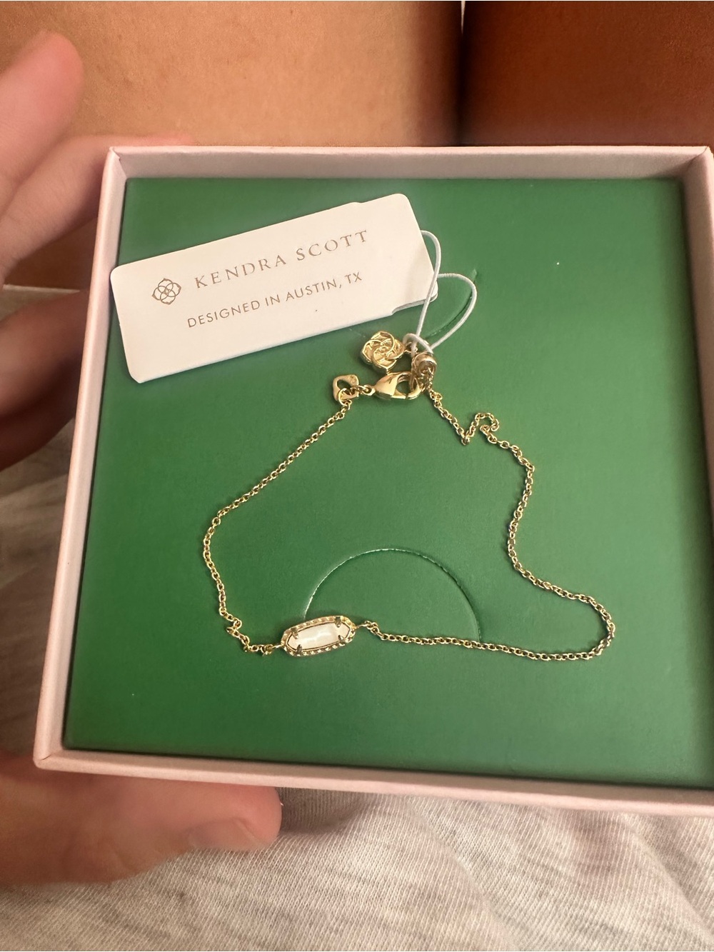 Kendra Scott Gold bracelet with White Faceted Stone